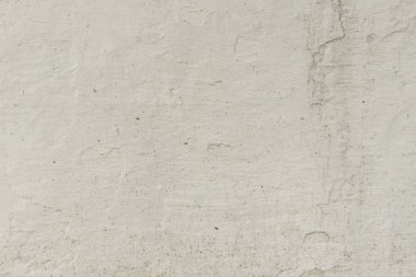 Çizikler ve çatlaklar ile duvar parçası. Arka plan olarak kullanılabilir