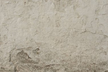 Çizikler ve çatlaklar ile duvar parçası. Arka plan olarak kullanılabilir