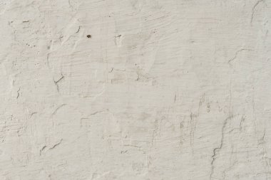 Çizikler ve çatlaklar ile duvar parçası. Arka plan olarak kullanılabilir