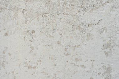 Çizikler ve çatlaklar ile duvar parçası. Arka plan olarak kullanılabilir