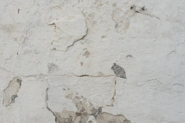 Çizikler ve çatlaklar ile duvar parçası. Arka plan olarak kullanılabilir