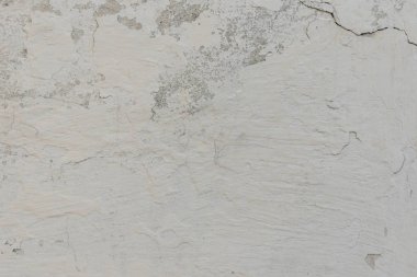 Çizikler ve çatlaklar ile duvar parçası. Arka plan olarak kullanılabilir