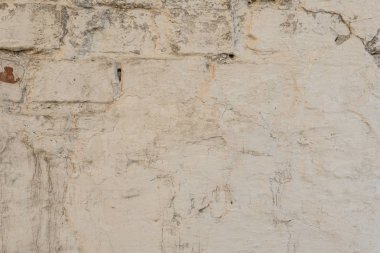 Çizikler ve çatlaklar ile duvar parçası. Arka plan olarak kullanılabilir