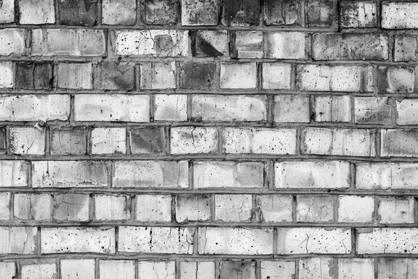 Brick texture with scratches and cracks. It can be used as a background