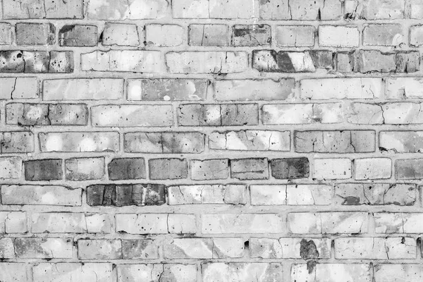 Brick texture with scratches and cracks. It can be used as a background
