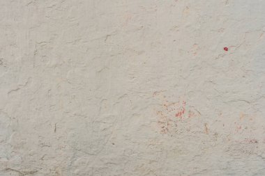 Çizikler ve çatlaklar ile duvar parçası. Arka plan olarak kullanılabilir