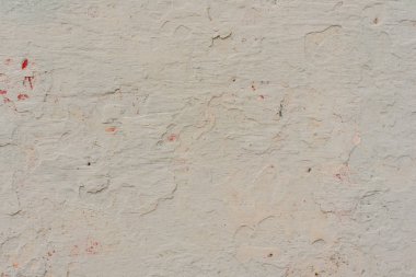 Çizikler ve çatlaklar ile duvar parçası. Arka plan olarak kullanılabilir