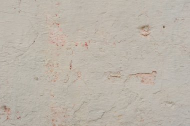 Çizikler ve çatlaklar ile duvar parçası. Arka plan olarak kullanılabilir