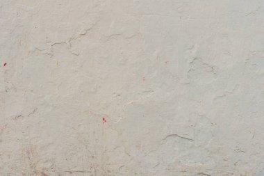 Çizikler ve çatlaklar ile duvar parçası. Arka plan olarak kullanılabilir