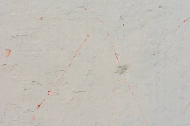 Çizikler ve çatlaklar ile duvar parçası. Arka plan olarak kullanılabilir