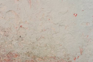 Çizikler ve çatlaklar ile duvar parçası. Arka plan olarak kullanılabilir