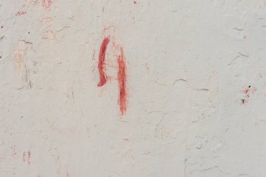 Çizikler ve çatlaklar ile duvar parçası. Arka plan olarak kullanılabilir