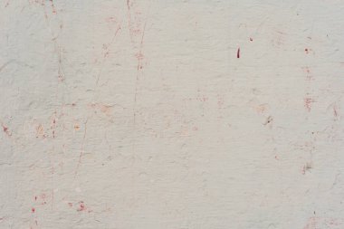 Çizikler ve çatlaklar ile duvar parçası. Arka plan olarak kullanılabilir