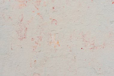 Çizikler ve çatlaklar ile duvar parçası. Arka plan olarak kullanılabilir