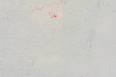 Çizikler ve çatlaklar ile duvar parçası. Arka plan olarak kullanılabilir