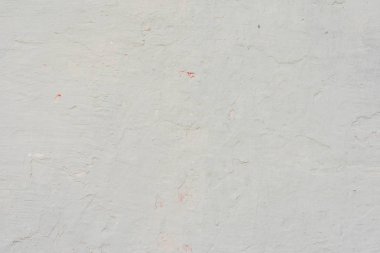 Çizikler ve çatlaklar ile duvar parçası. Arka plan olarak kullanılabilir