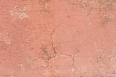 Çizikler ve çatlaklar ile duvar parçası. Arka plan olarak kullanılabilir