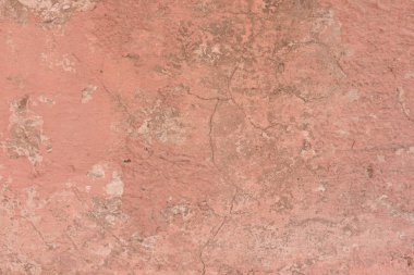 Çizikler ve çatlaklar ile duvar parçası. Arka plan olarak kullanılabilir