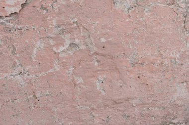 Çizikler ve çatlaklar ile duvar parçası. Arka plan olarak kullanılabilir