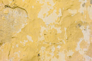 Çizikler ve çatlaklar ile duvar parçası. Arka plan olarak kullanılabilir