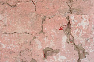 Çizikler ve çatlaklar ile duvar parçası. Arka plan olarak kullanılabilir