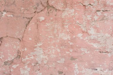 Çizikler ve çatlaklar ile duvar parçası. Arka plan olarak kullanılabilir