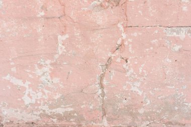 Çizikler ve çatlaklar ile duvar parçası. Arka plan olarak kullanılabilir