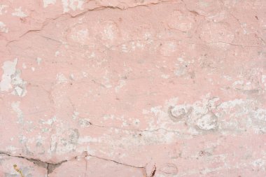 Çizikler ve çatlaklar ile duvar parçası. Arka plan olarak kullanılabilir