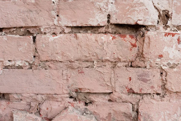 Çizikler ve çatlaklar ile tuğla doku. Arka plan olarak kullanılabilir