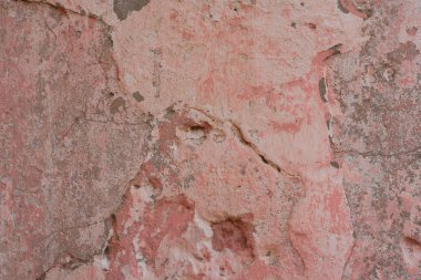 Çizikler ve çatlaklar ile duvar parçası. Arka plan olarak kullanılabilir