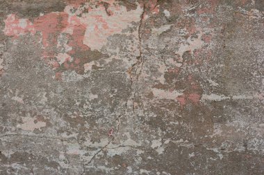 Çizikler ve çatlaklar ile duvar parçası. Arka plan olarak kullanılabilir