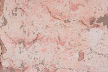 Çizikler ve çatlaklar ile duvar parçası. Arka plan olarak kullanılabilir