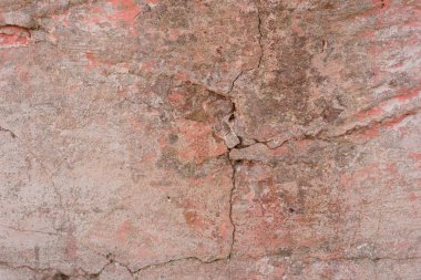 Çizikler ve çatlaklar ile duvar parçası. Arka plan olarak kullanılabilir