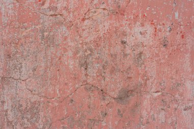 Çizikler ve çatlaklar ile duvar parçası. Arka plan olarak kullanılabilir