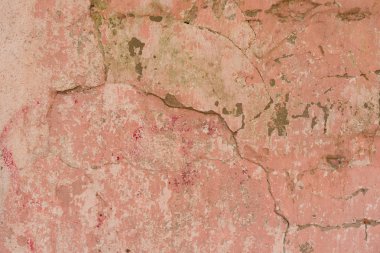 Çizikler ve çatlaklar ile duvar parçası. Arka plan olarak kullanılabilir