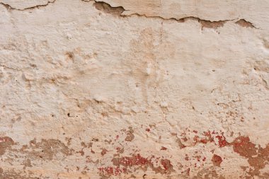 Çizikler ve çatlaklar ile duvar parçası. Arka plan olarak kullanılabilir
