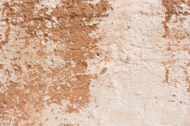 Çizikler ve çatlaklar ile duvar parçası. Arka plan olarak kullanılabilir