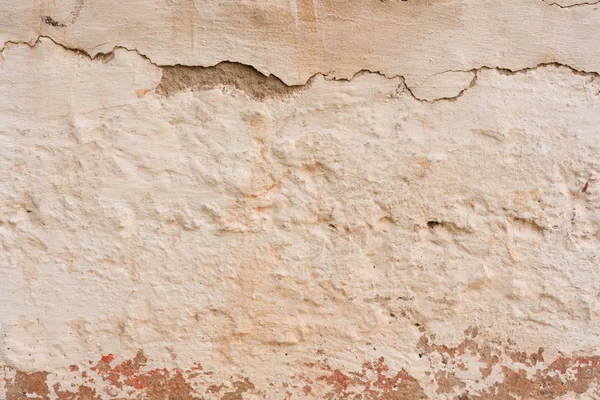 Çizikler ve çatlaklar ile duvar parçası. Arka plan olarak kullanılabilir