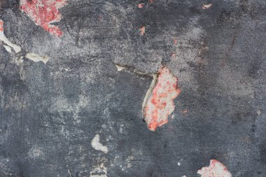 Çizikler ve çatlaklar ile duvar parçası. Arka plan olarak kullanılabilir