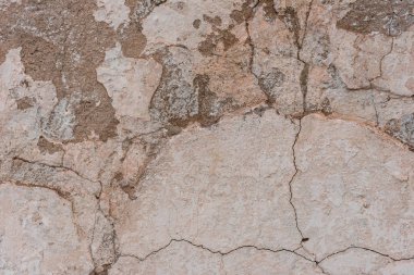 Çizikler ve çatlaklar ile duvar parçası. Arka plan olarak kullanılabilir