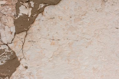 Çizikler ve çatlaklar ile duvar parçası. Arka plan olarak kullanılabilir