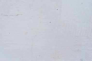 Çizikler ve çatlaklar ile duvar parçası. Arka plan olarak kullanılabilir