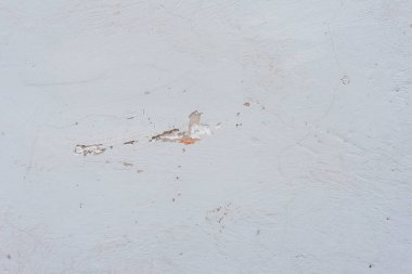 Çizikler ve çatlaklar ile duvar parçası. Arka plan olarak kullanılabilir