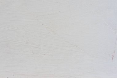 Çizikler ve çatlaklar ile duvar parçası. Arka plan olarak kullanılabilir