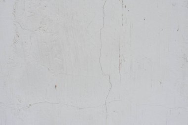 Çizikler ve çatlaklar ile duvar parçası. Arka plan olarak kullanılabilir