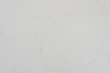 Çizikler ve çatlaklar ile duvar parçası. Arka plan olarak kullanılabilir