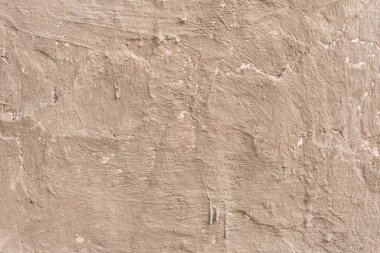 Çizikler ve çatlaklar ile duvar parçası. Arka plan olarak kullanılabilir