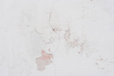 Çizikler ve çatlaklar ile duvar parçası. Arka plan olarak kullanılabilir