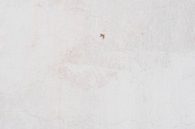 Çizikler ve çatlaklar ile duvar parçası. Arka plan olarak kullanılabilir