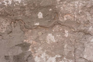 Çizikler ve çatlaklar ile duvar parçası. Arka plan olarak kullanılabilir